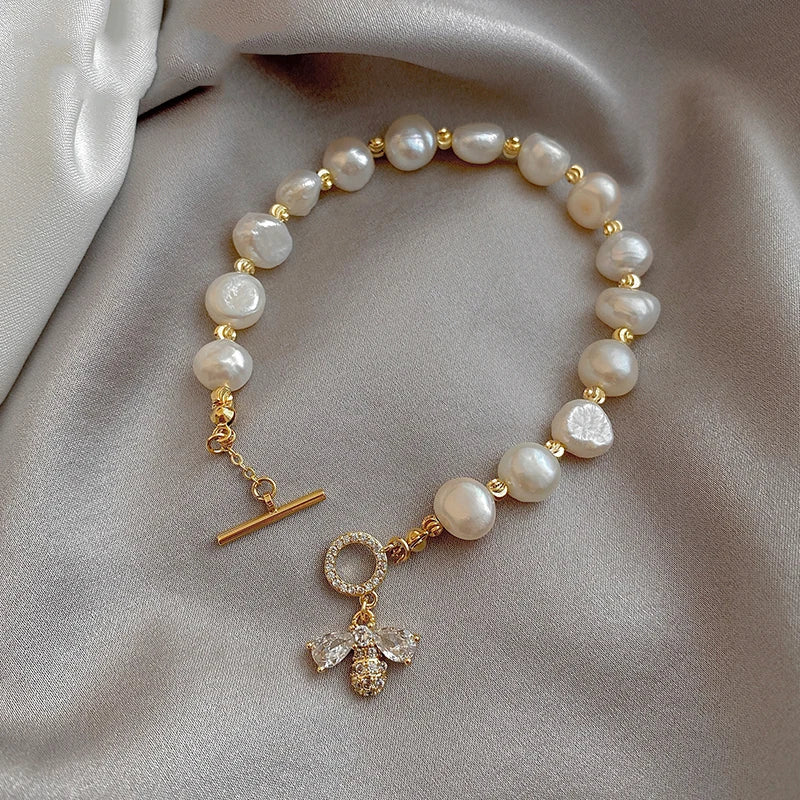 Lustrous Pearl and Bee Charm Bracelet