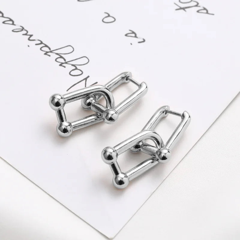 Elegance Unfolded Earrings: Double U Shape Drop Earrings