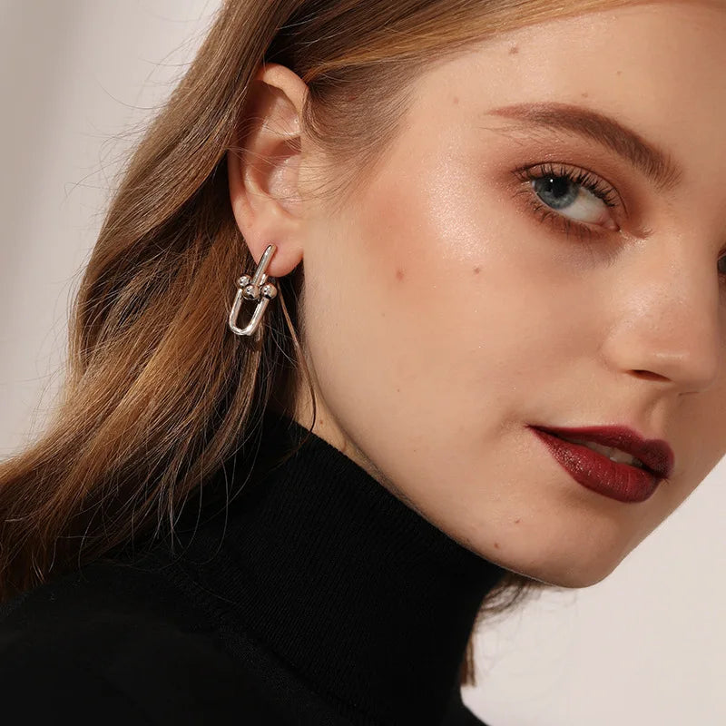 Elegance Unfolded Earrings: Double U Shape Drop Earrings
